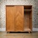 Armoire parisienne penderie porte coulissante chêne brut massif 1960
