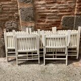 Five wooden garden armchairs