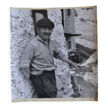 Old silver print photo of a man's portrait circa 1970