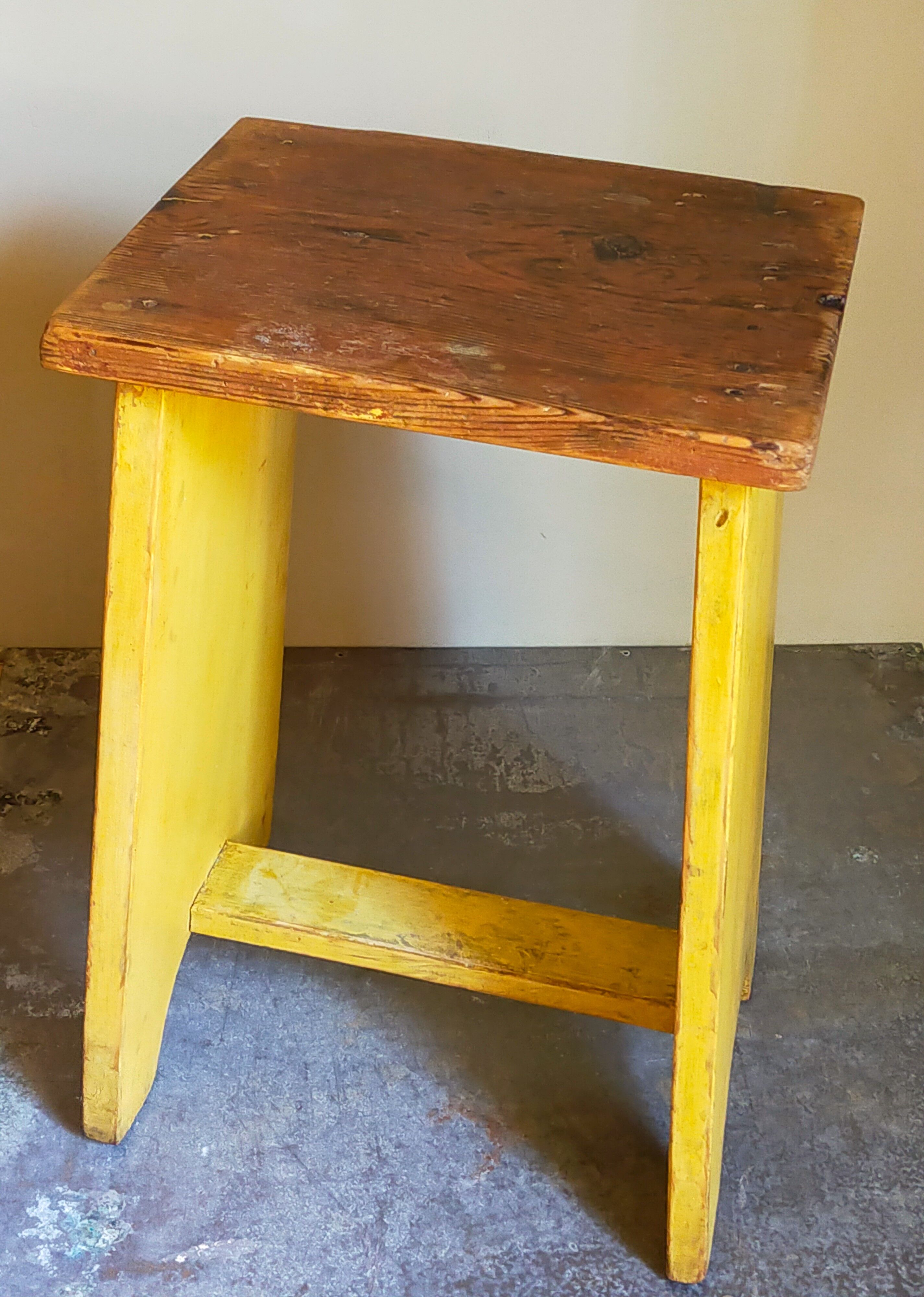 Art-populaire workshop stool in patinated painted wood