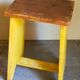 Art-populaire workshop stool in patinated painted wood