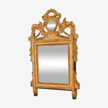 Louis XVI mirror in gilded wood 35x 65cm