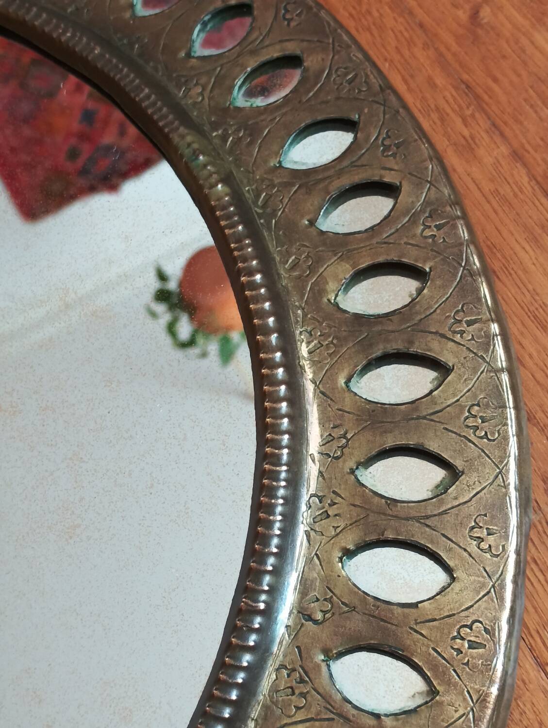 Oriental brass mirror