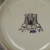 Gien earthenware vase on XX century blue background