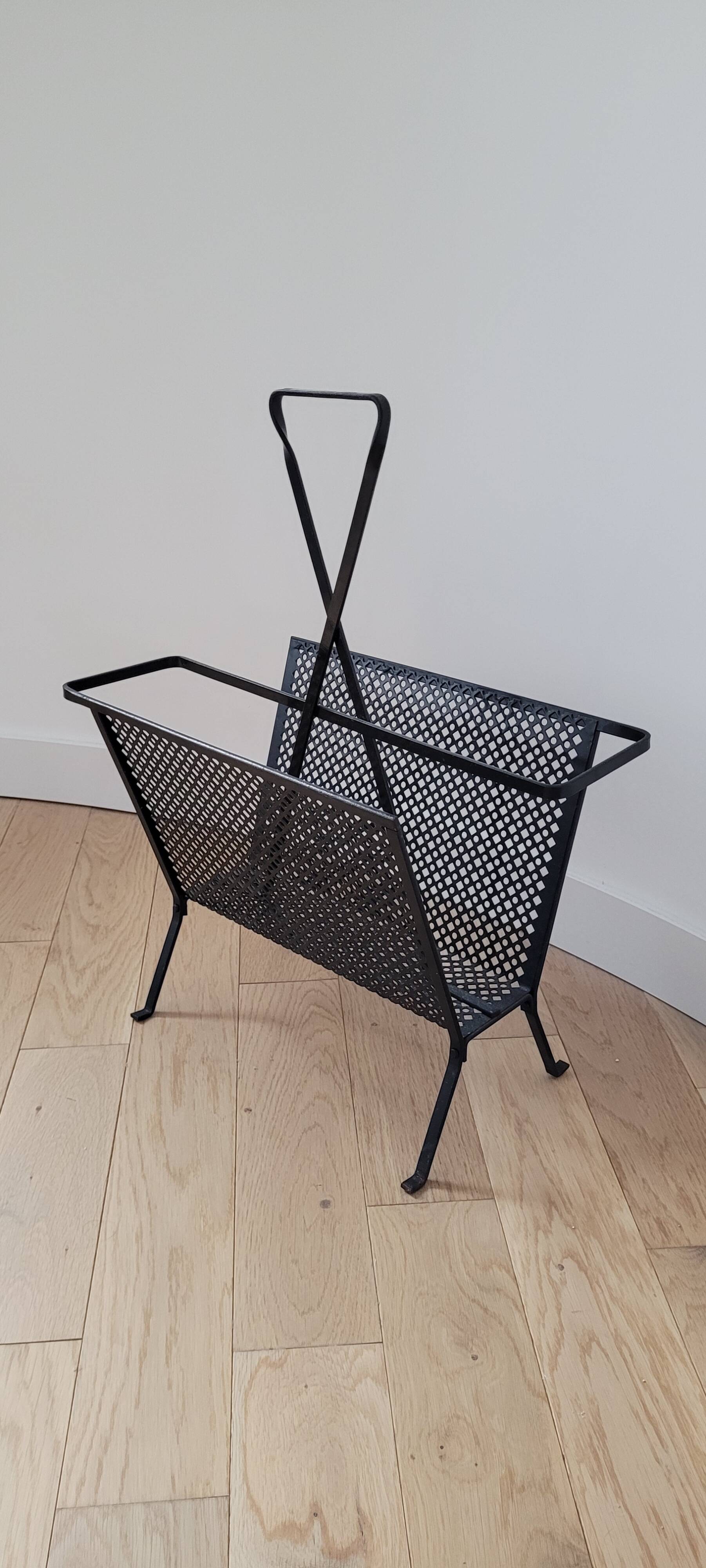 Magazine rack by Mathieu Mategot