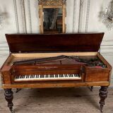 Piano table in rosewood with mother-of-pearl and fruitwood marquetry circa 1830.
