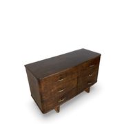 A vintage Italian chest of drawers, made of veneered walnut and solid wood,