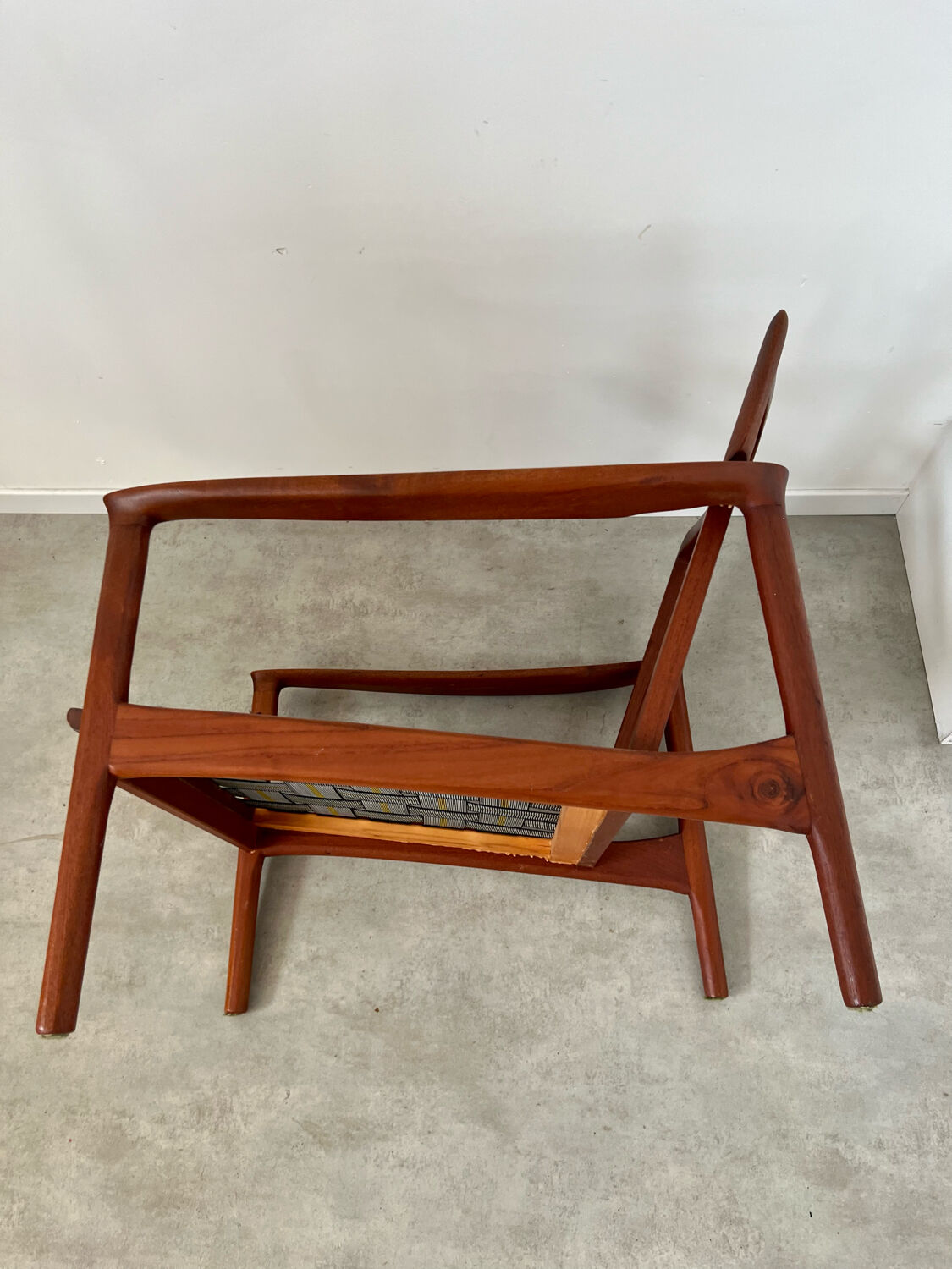 Old Scandinavian design armchair in vintage teak year 60