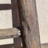Two weathered wooden ladders H.135 cm