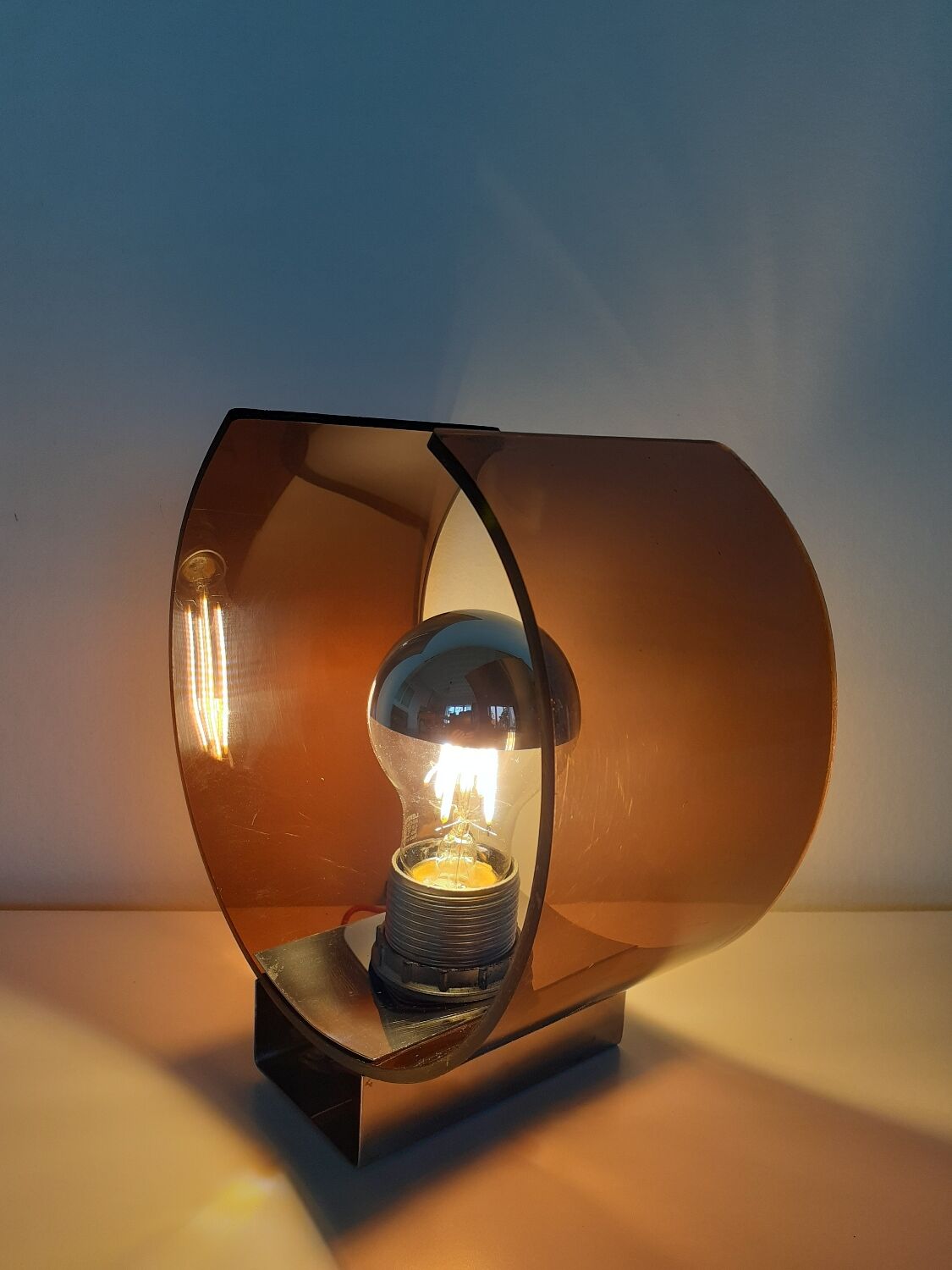 Space age plexiglass wall light.