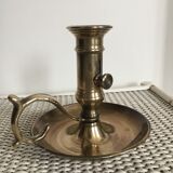 Old brass candlestick called "rat tail"