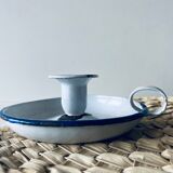 Old enamelled metal candlestick