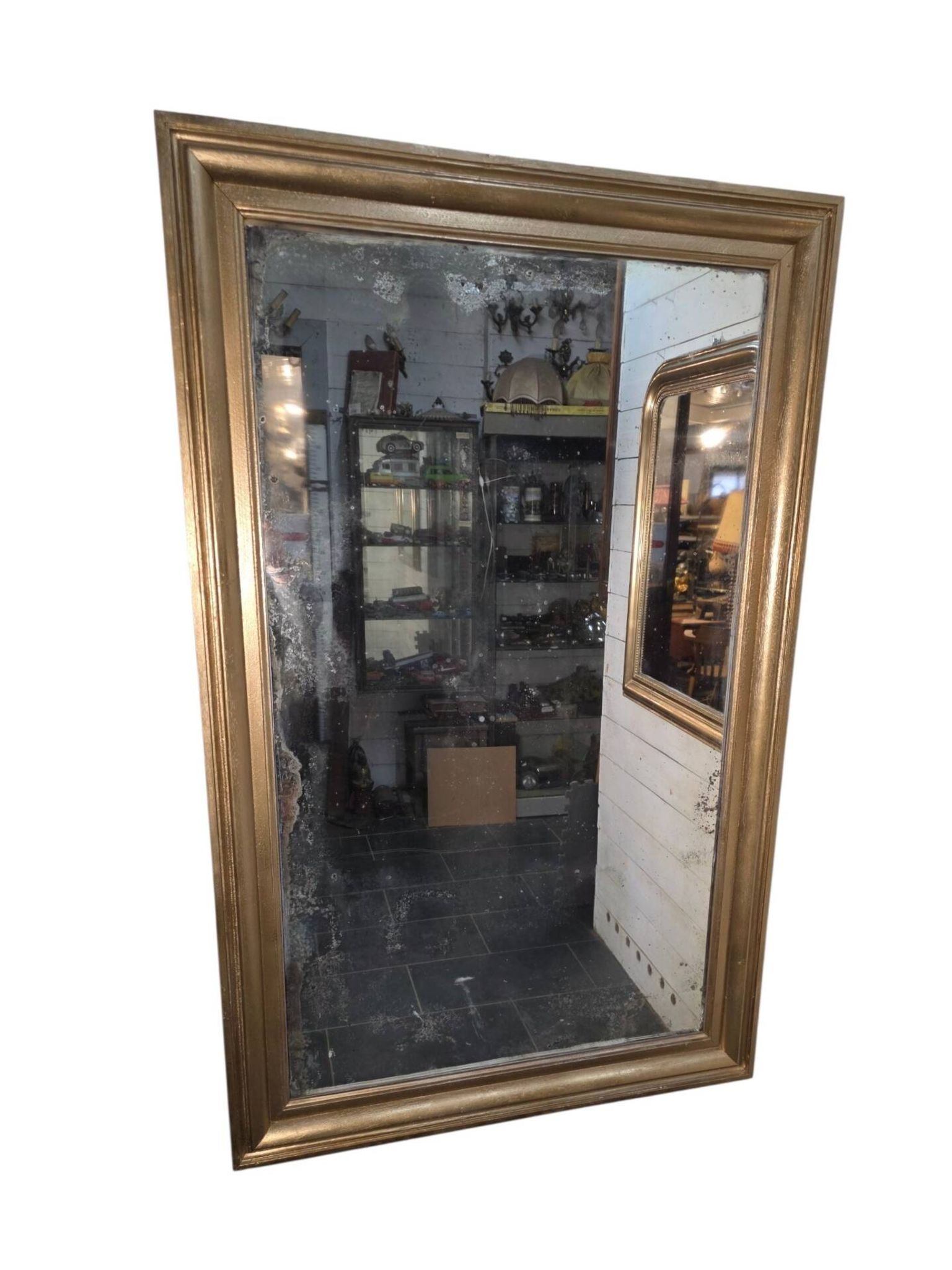 Golden mirror in oak from the 19th century.