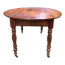 Louis Philippe oval shuttered table in solid cherry wood with 2 drawers.