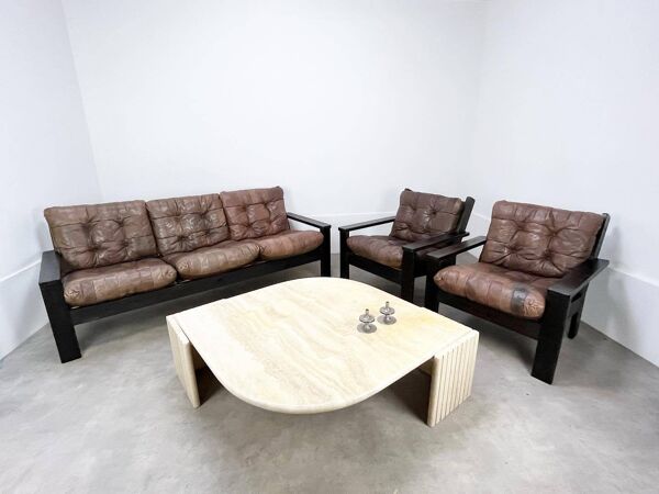 Table basse travertin forme œil par Roche Bobois