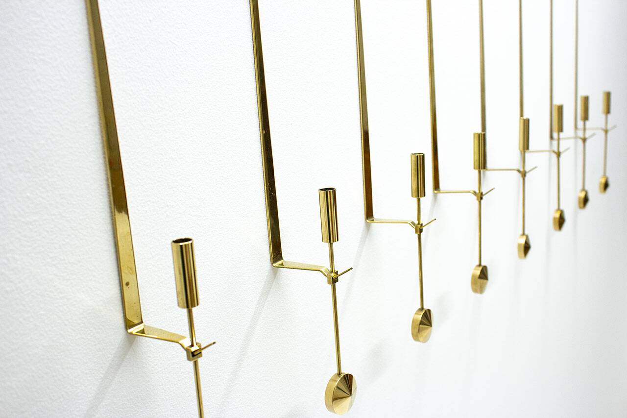 Group of 10 Swedish brass candle sconces by Pierre Forssell for Skultuna