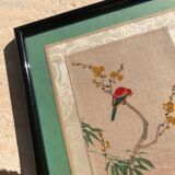 Bird painting on a branch