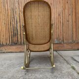 Vintage rocking chair in gilded brass and brown rattan - 1950s design