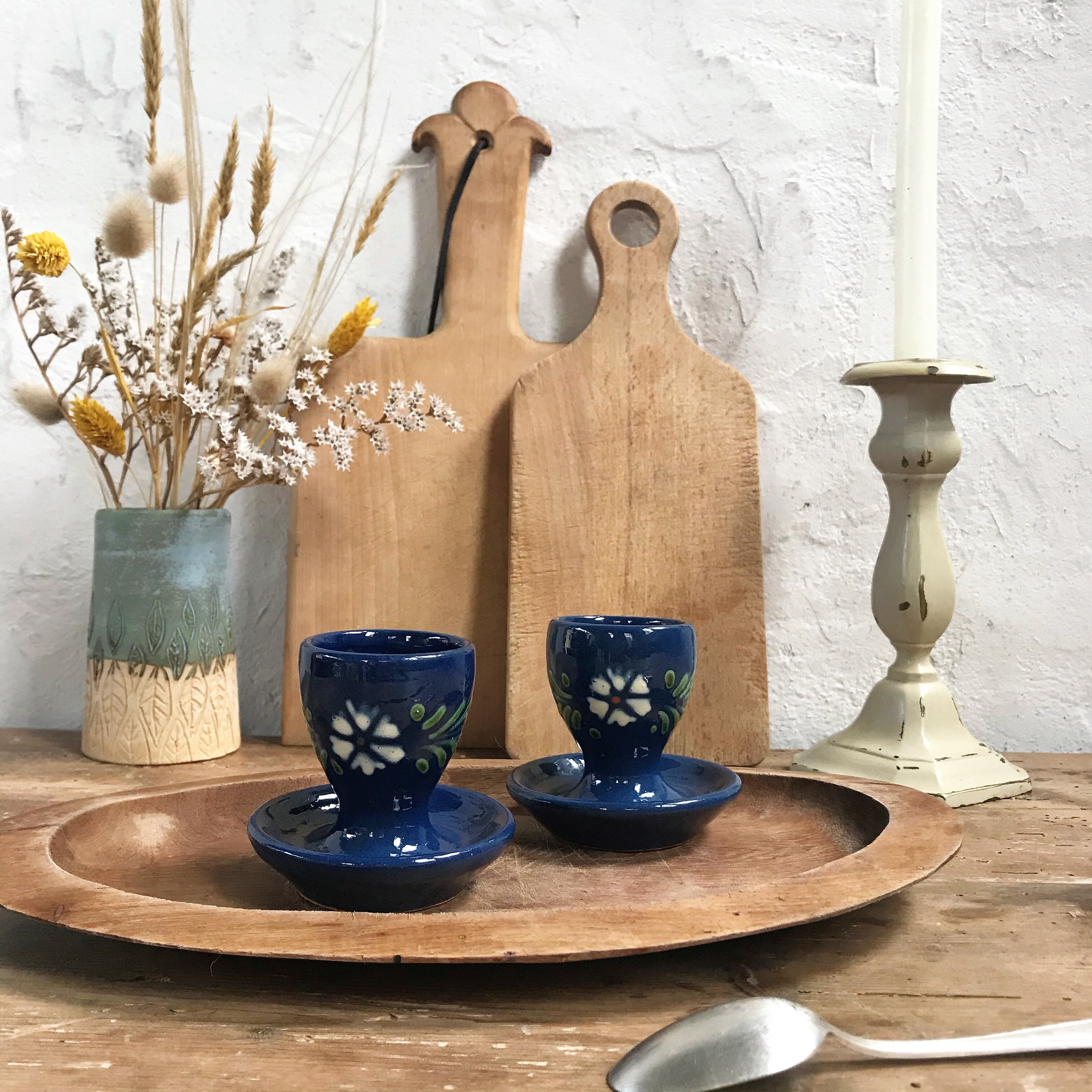 Pair of ceramic cockroaches