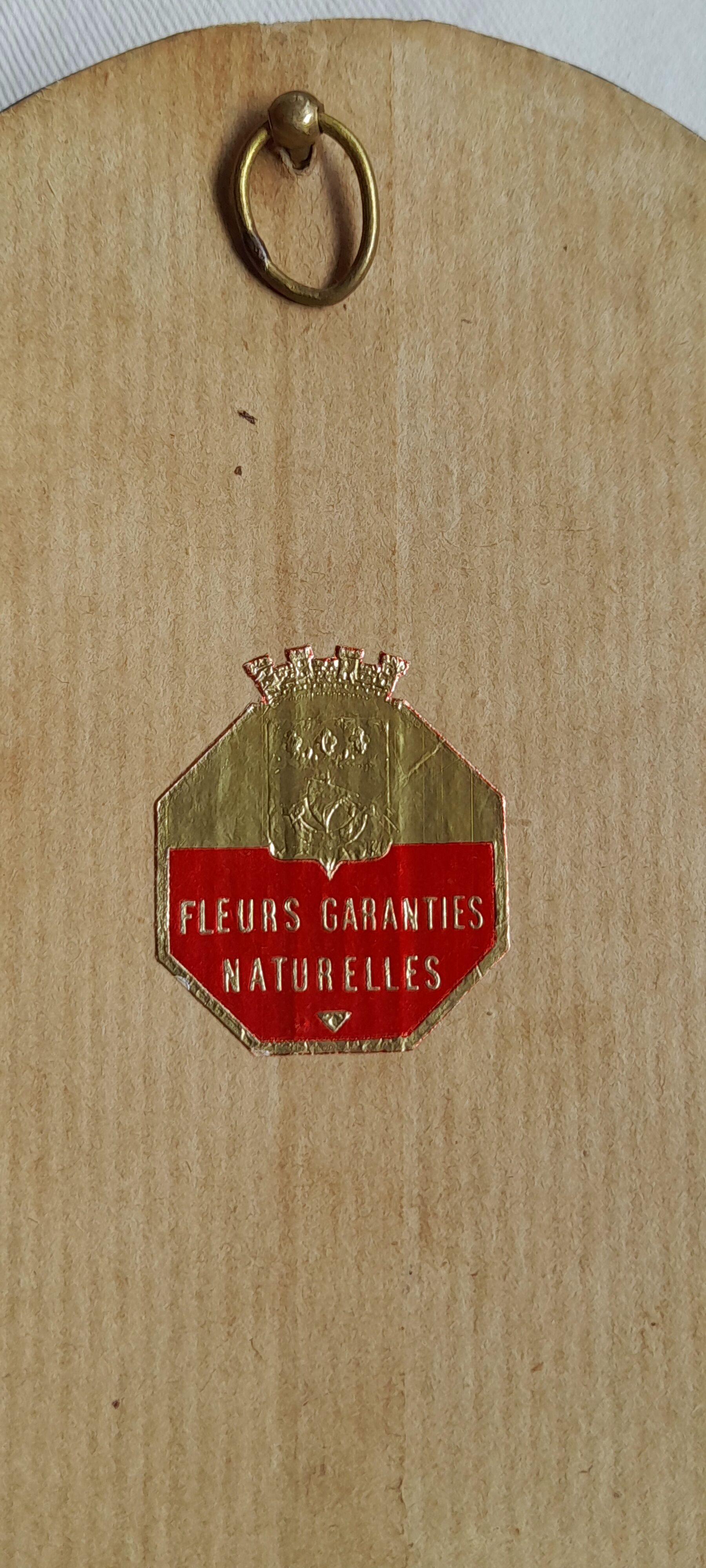 Oval frame dried flower