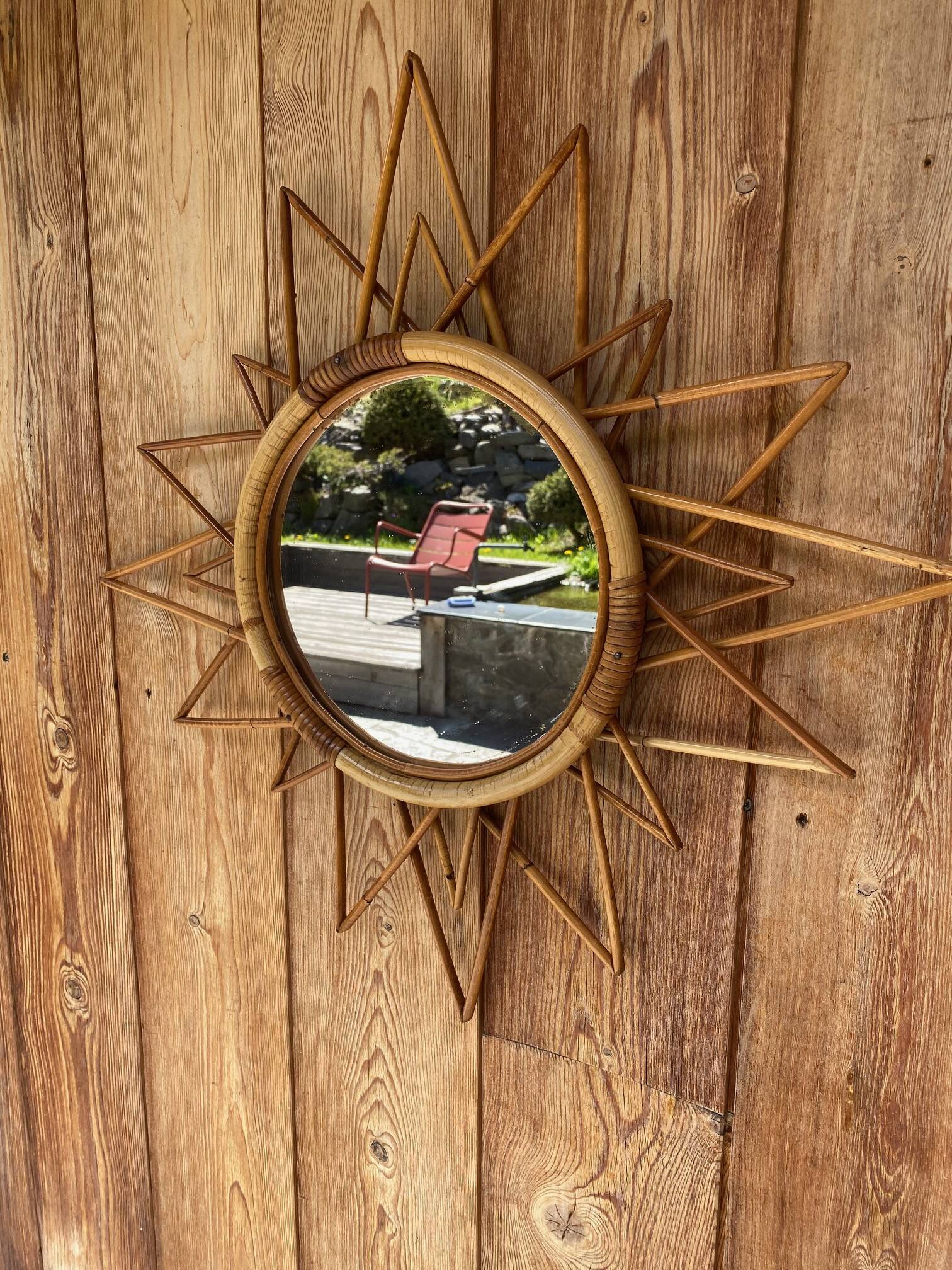 Vintage 60s/70s rattan sun mirror.