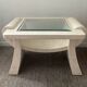 Table basse vintage en travertin et verre biseauté