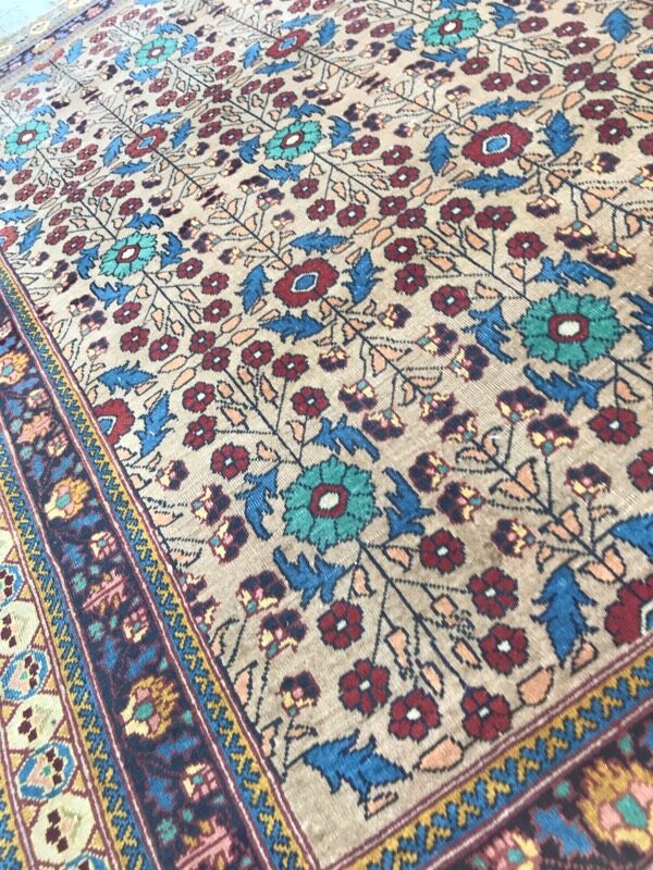 Pretty handmade old persian rug
