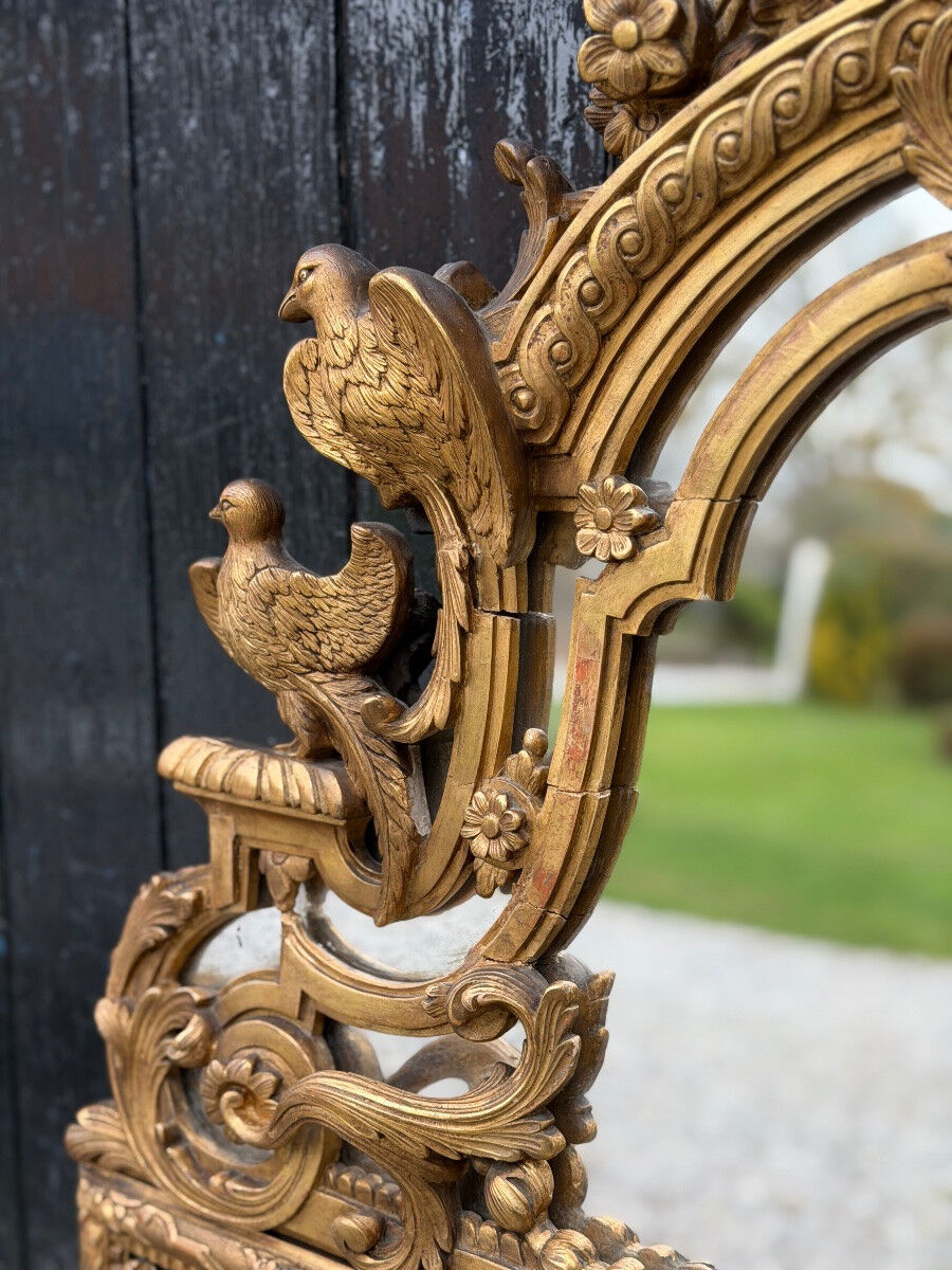 Regency style mirror in gilded wood, 19th century