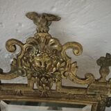 Napoleon III wall mirror with 3 bronze candlesticks and antique figures