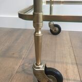 Neoclassical brass rolling table with double glass tops