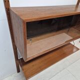 Teak shelving system with glass cabinet, marked made in Denmark, 1960.