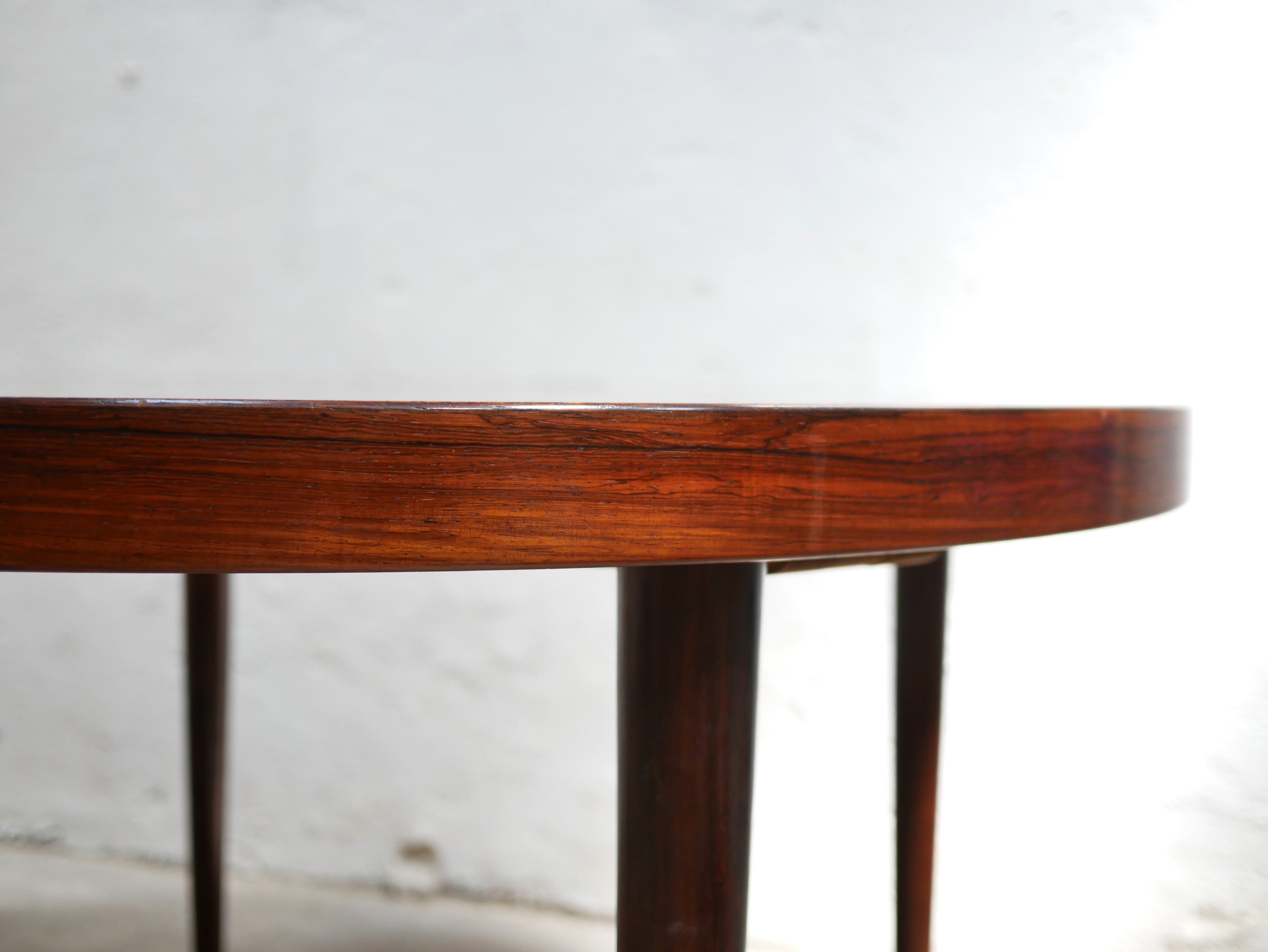 Vintage rosewood extendable Scandinavian round table by Kai Kristiansen for Skovmand and Anders