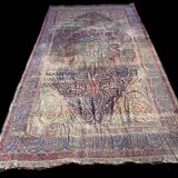 Ancient persian kirman carpet