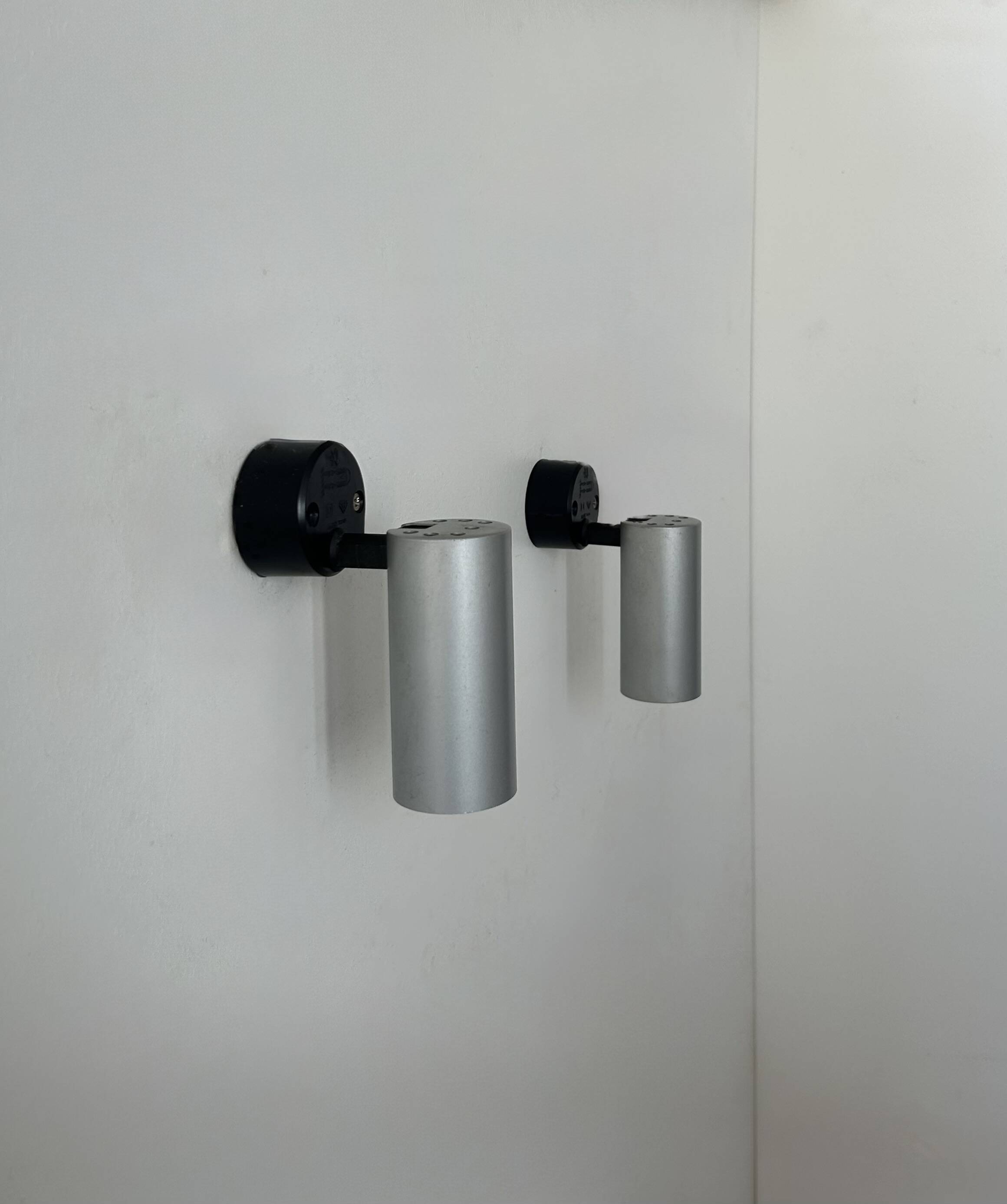 Pair of vintage adjustable brushed aluminum wall lights, France, 1970s