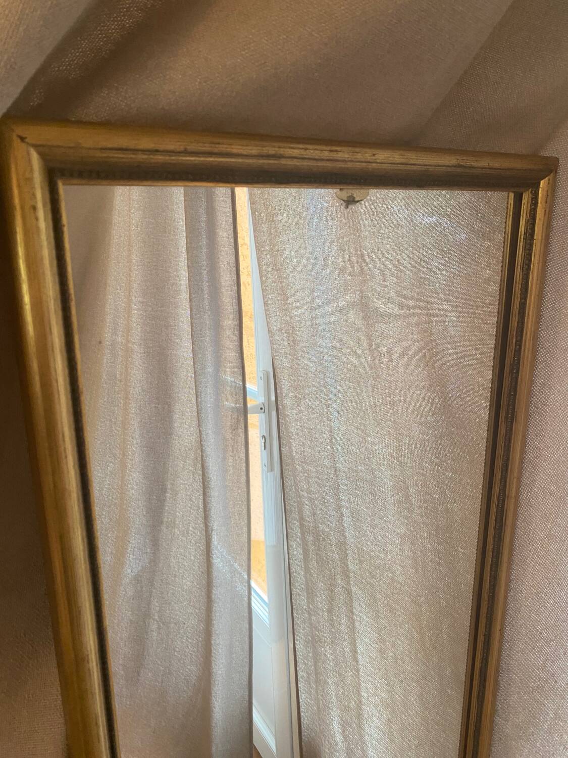 Large and old wooden mirror