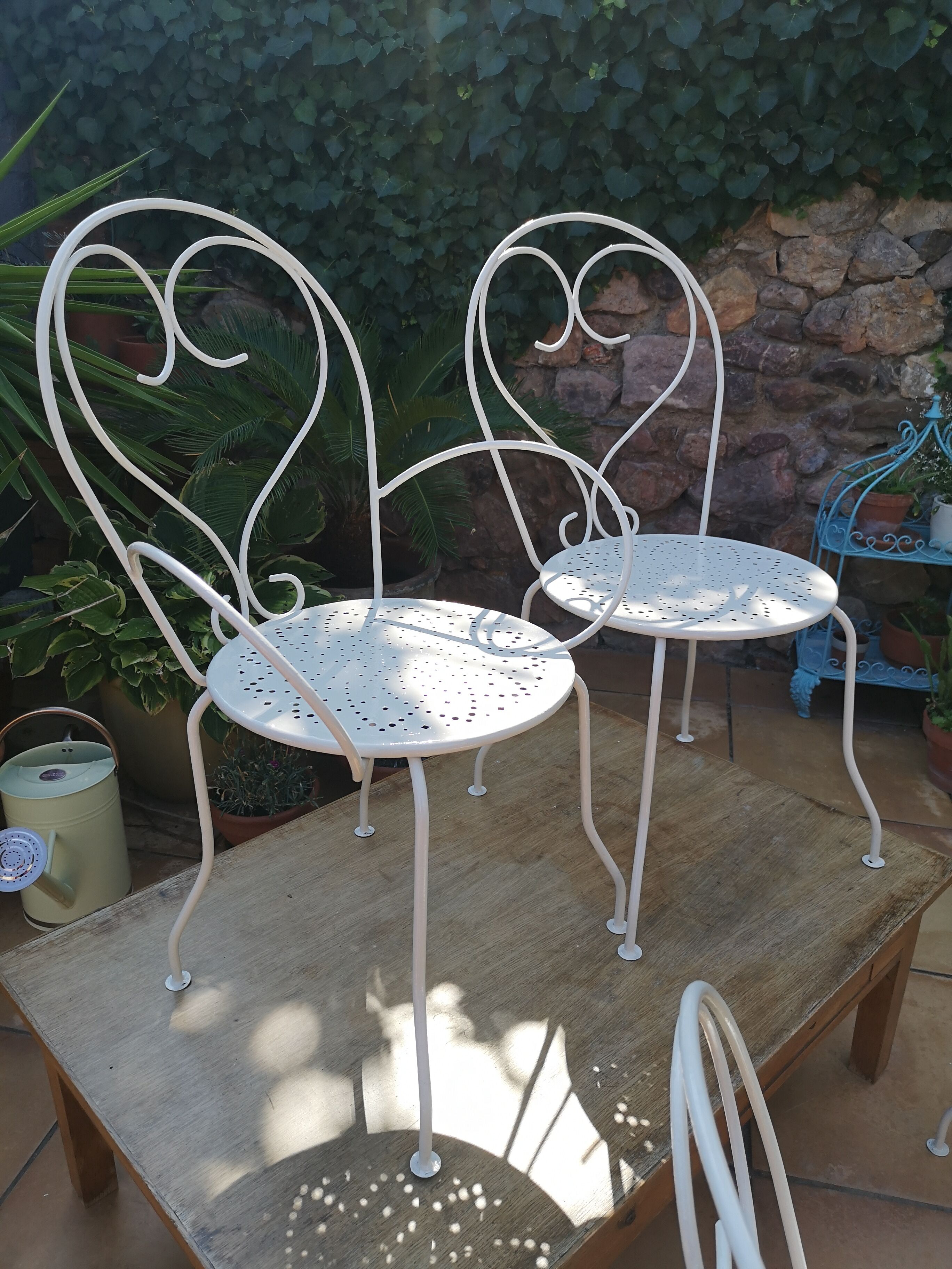 Lot of wrought iron chairs and armchairs