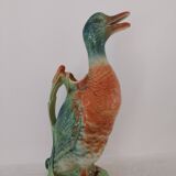Water jug in slipware from the 1960s. Decorated with a coloured duck. Unmarked.
