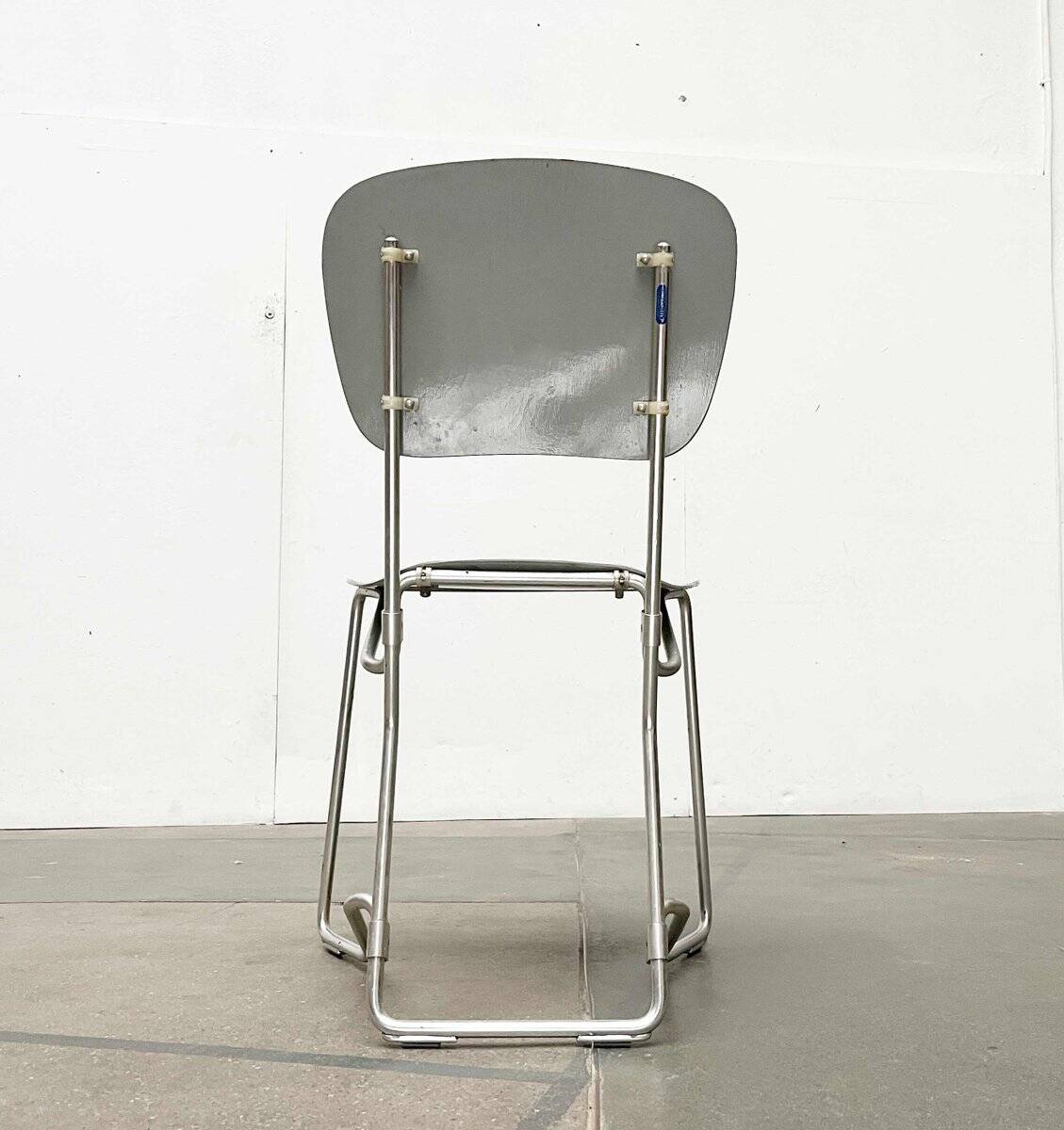 Stackable folding chair in space age style from the mid-century by Armin Wirth for Aluflex, 1960s, set of 3.