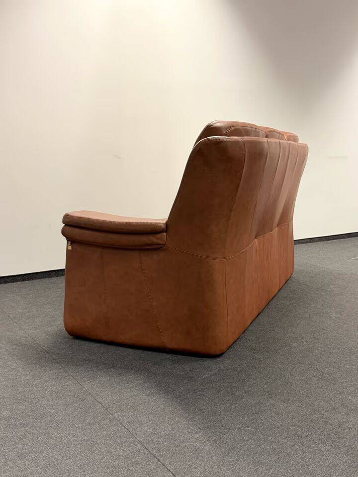 Leather  2-piece set-sofa and armchair from Elastoform