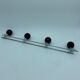 Coat holder 4 chrome steel pateres and black wooden balls