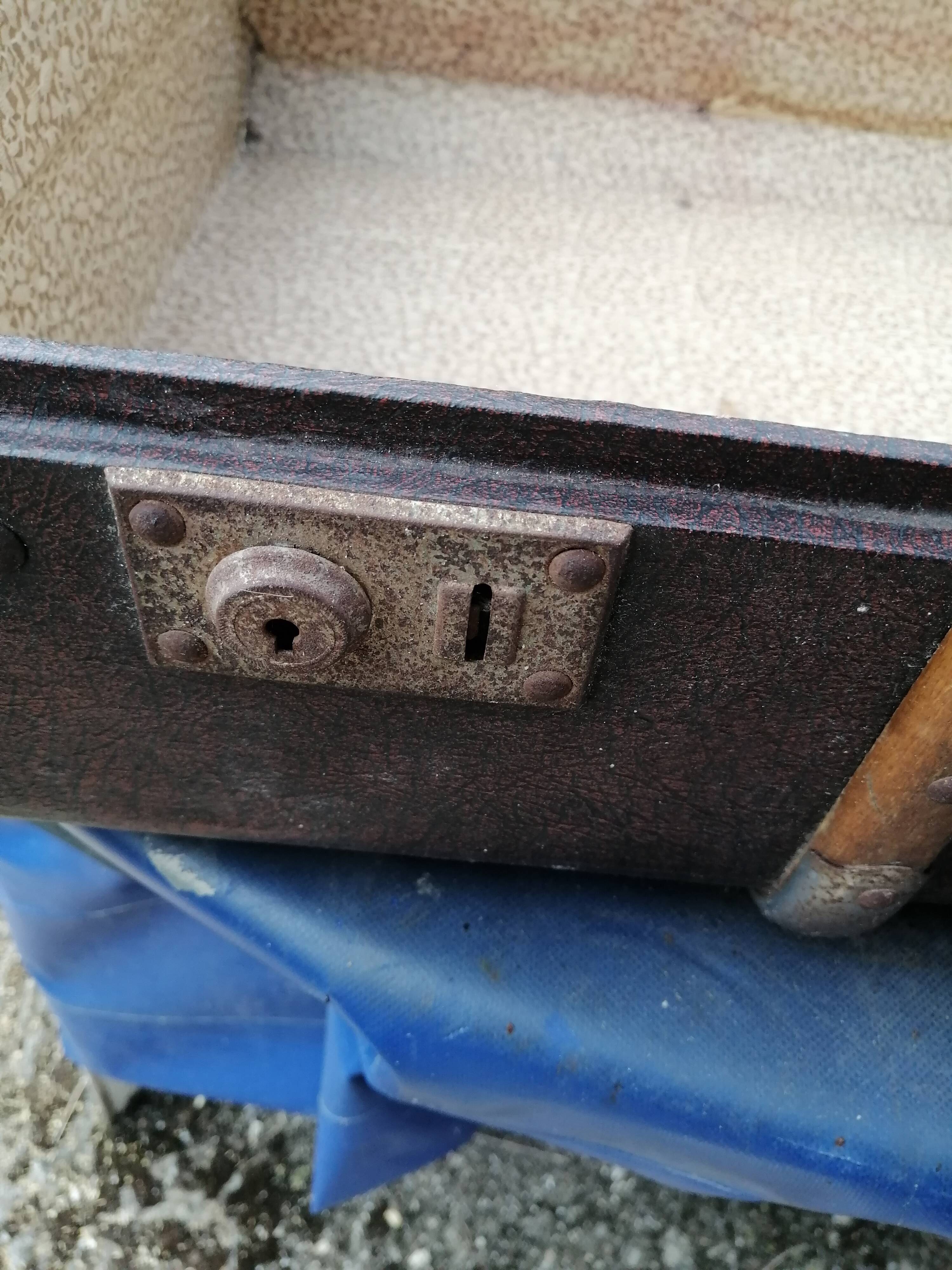 Antique suitcase in leather wood and vintage metal