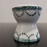 Old porcelain diabolo egg cup decorated with green frieze and garlands