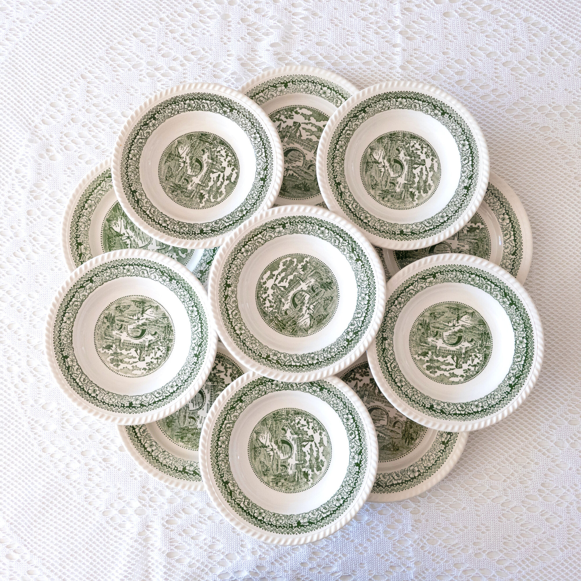 Service of vintage green plates in country English earthenware