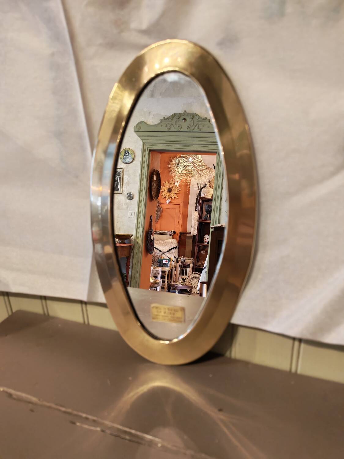 Vintage Urdu mirror in brass