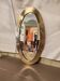 Vintage Urdu mirror in brass