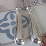 12 silver metal knives