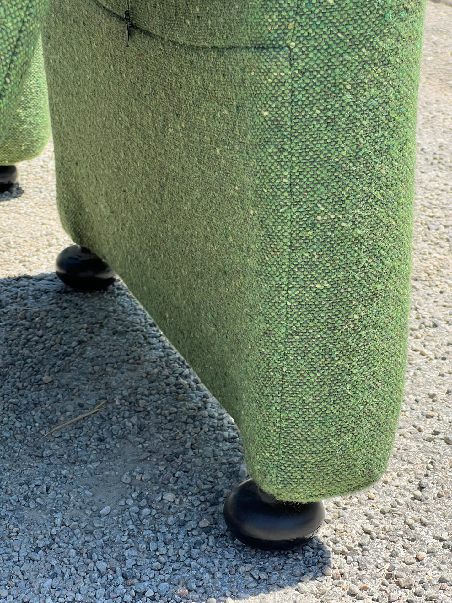 Green armchairs designed by Étienne Fermigier