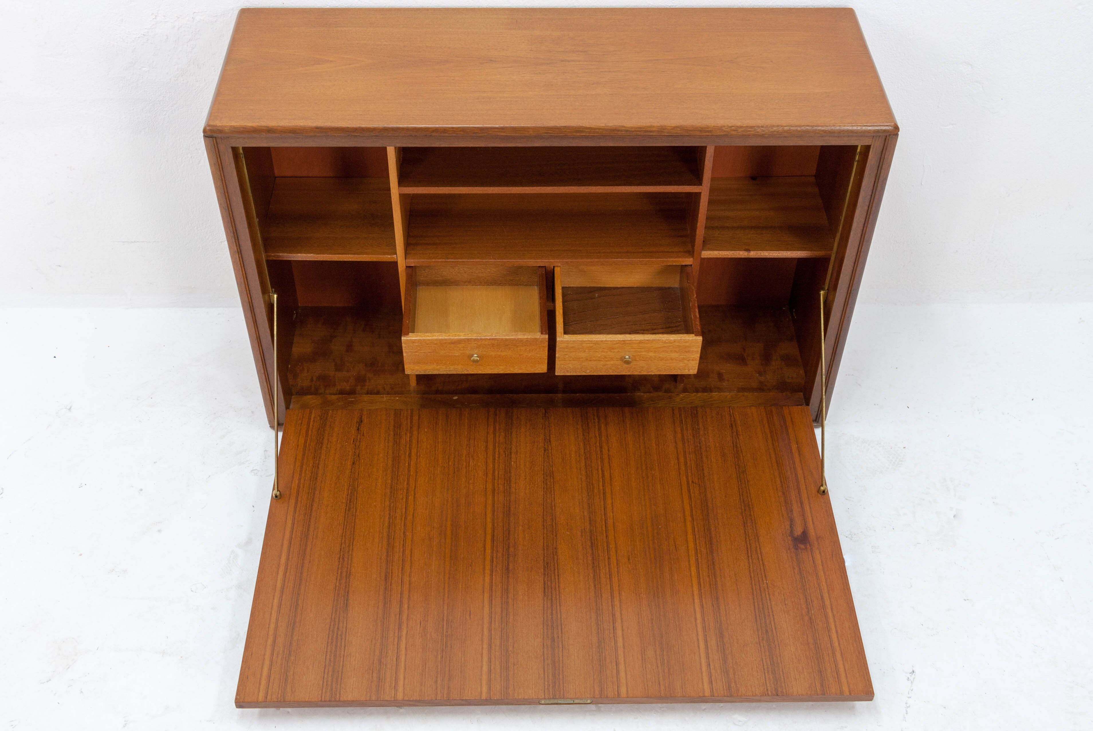 Secretary teak wall