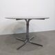 70s round table with smoked glass and chrome