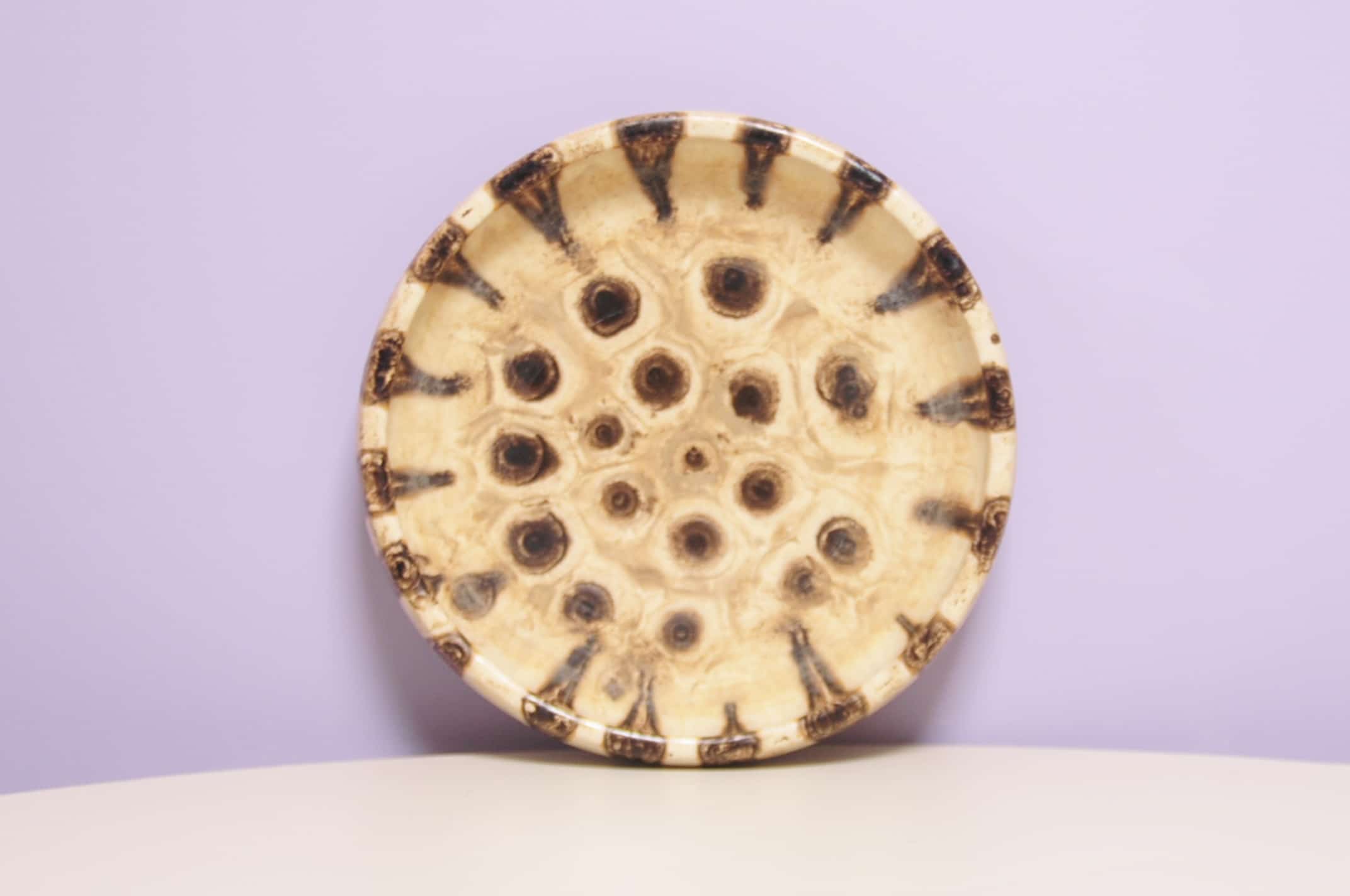 Beige round bowl with dots